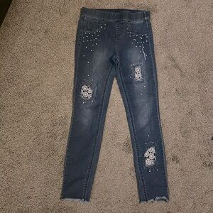 Justice girls skinny jeans, size 10.  Lace and pearl embellishments.